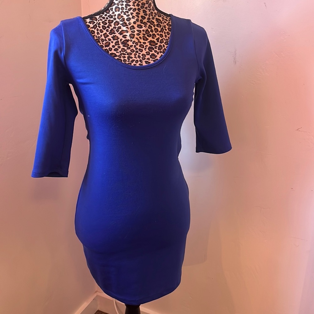 Only worn once. Can dress up or dress down cute blue dress